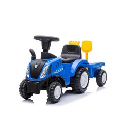 New Holland traktor med vogn, skovl og rive